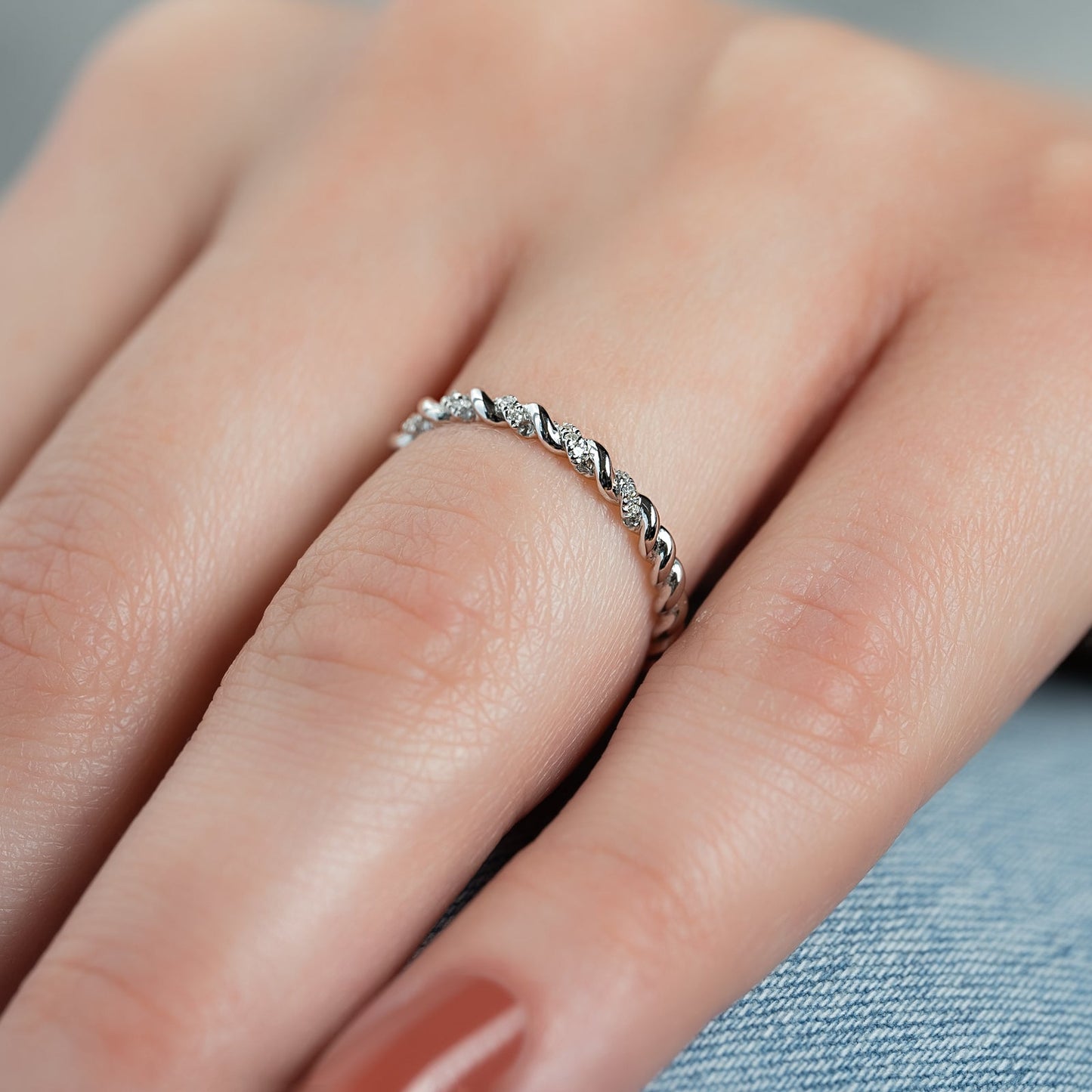 0.05 TCW Round Moissanite Twisted Wedding Band