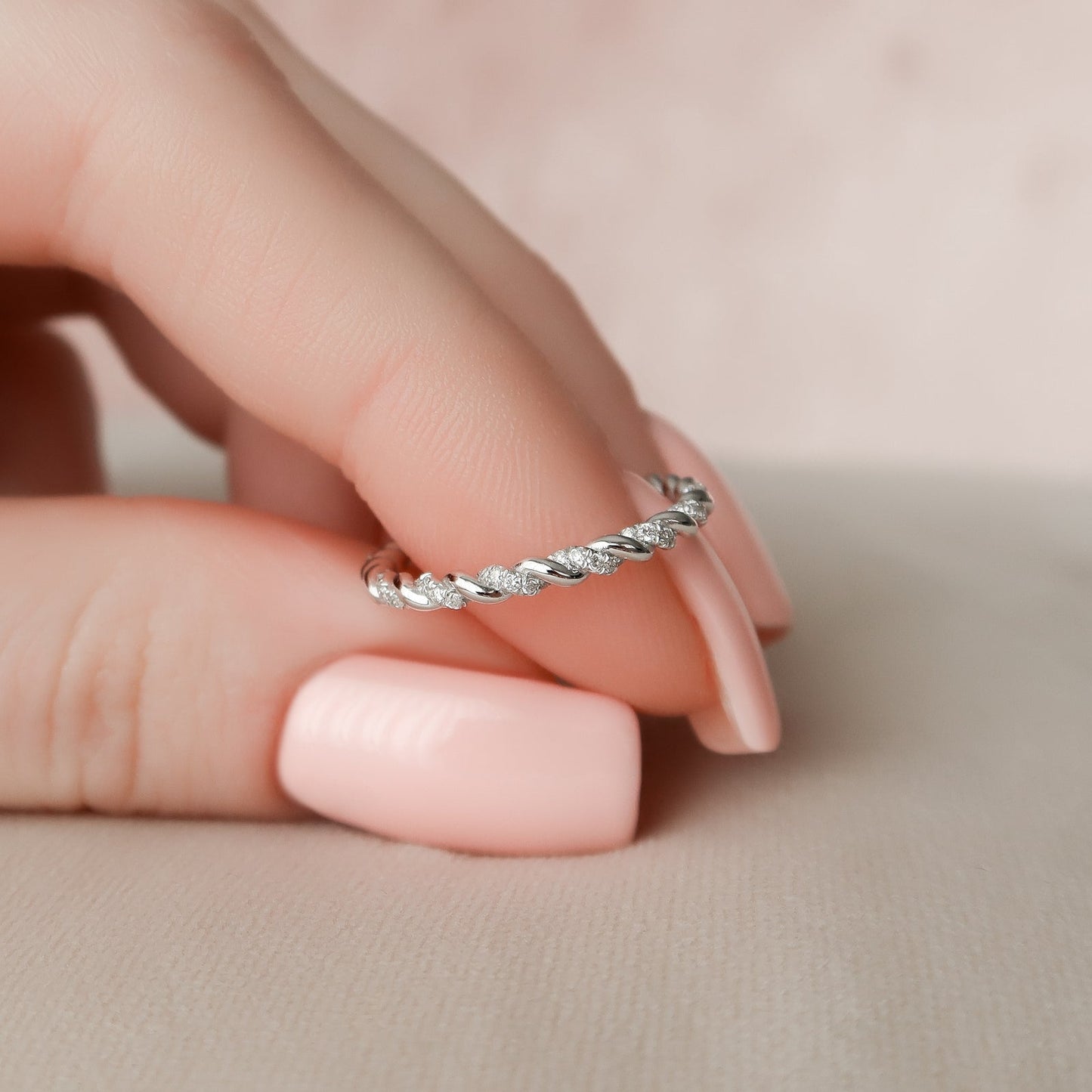 0.05 TCW Round Moissanite Twisted Wedding Band