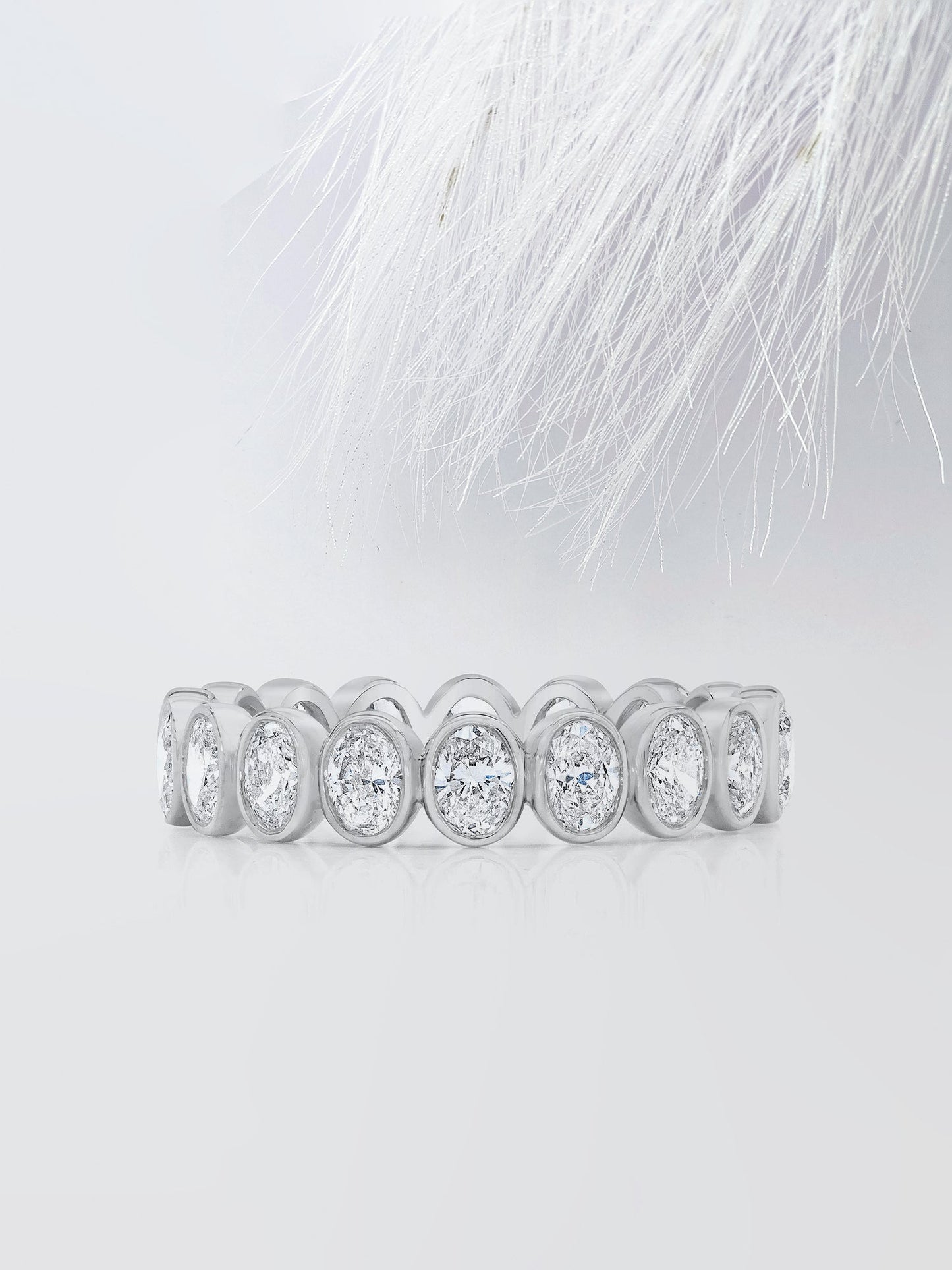 Oval Cut Bezel Diamond Wedding Band For Women