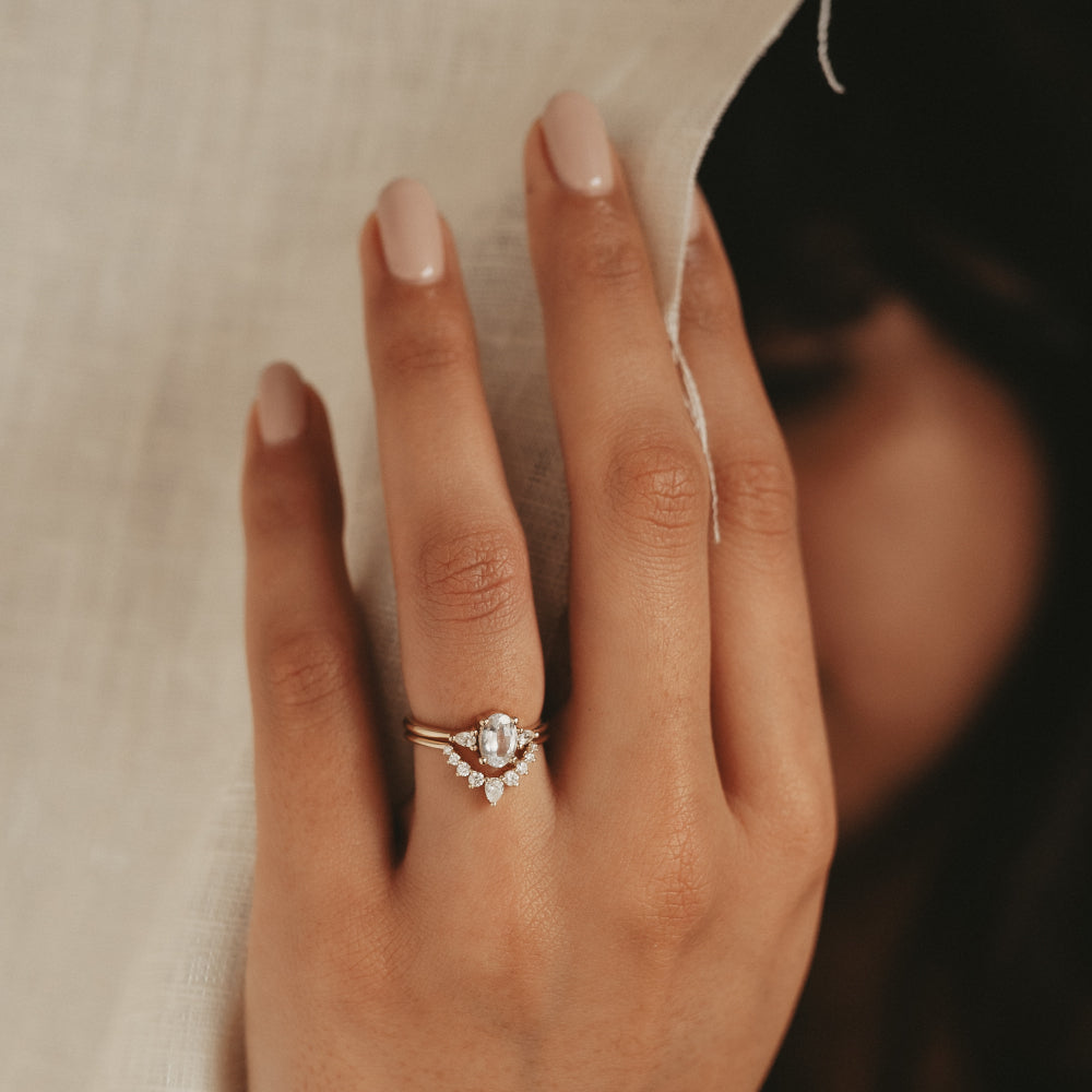 0.22 TCW Pear & Round Moissanite Curved Wedding Band