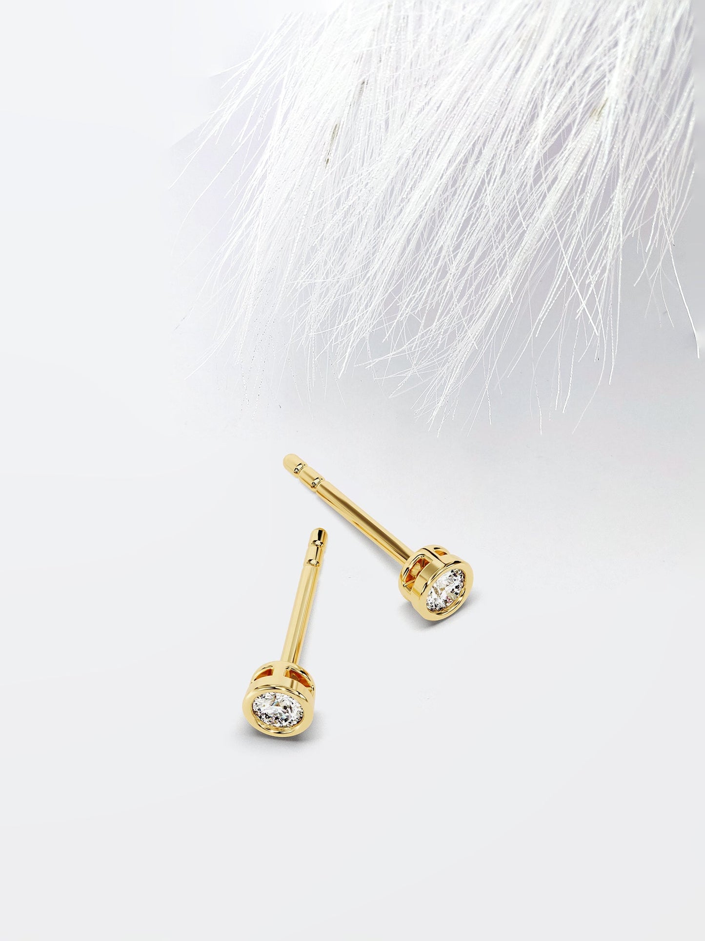 Round Cut Bezel Set Moissanite Stud Diamond Earrings in 14k Yellow Gold