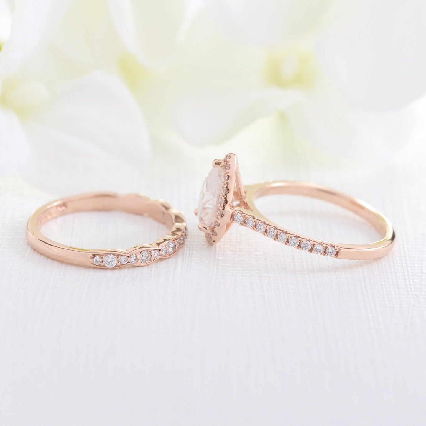 Pear Cut Moissanite Ring With Diamond Band