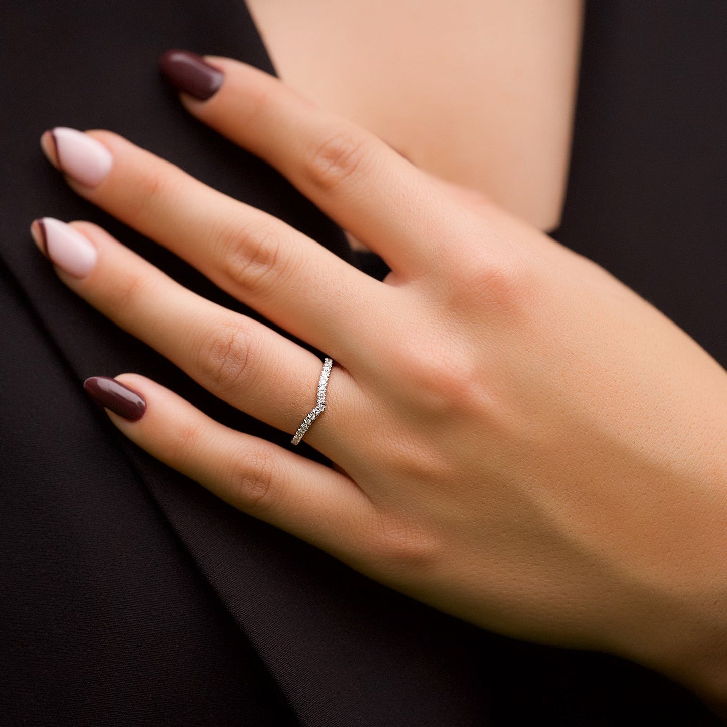 0.18 TCW Round Moissanite Curved Wedding Band