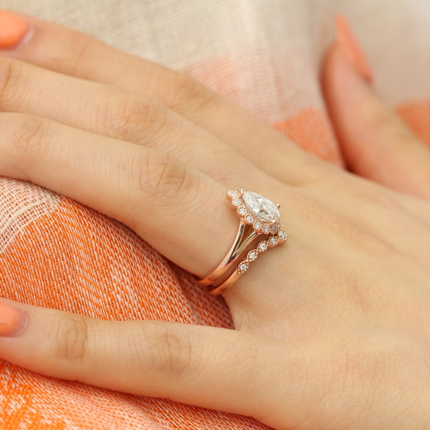 Pear Cut Moissanite Ring With Curve Halo Diamond Band
