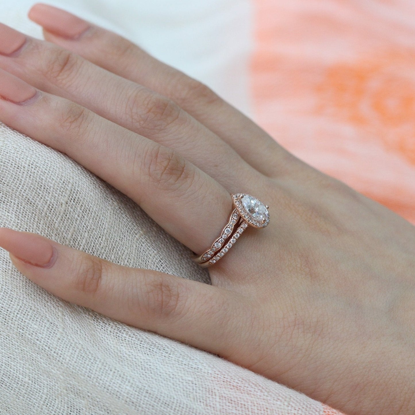 Pear Cut Moissanite Ring With Diamond Band
