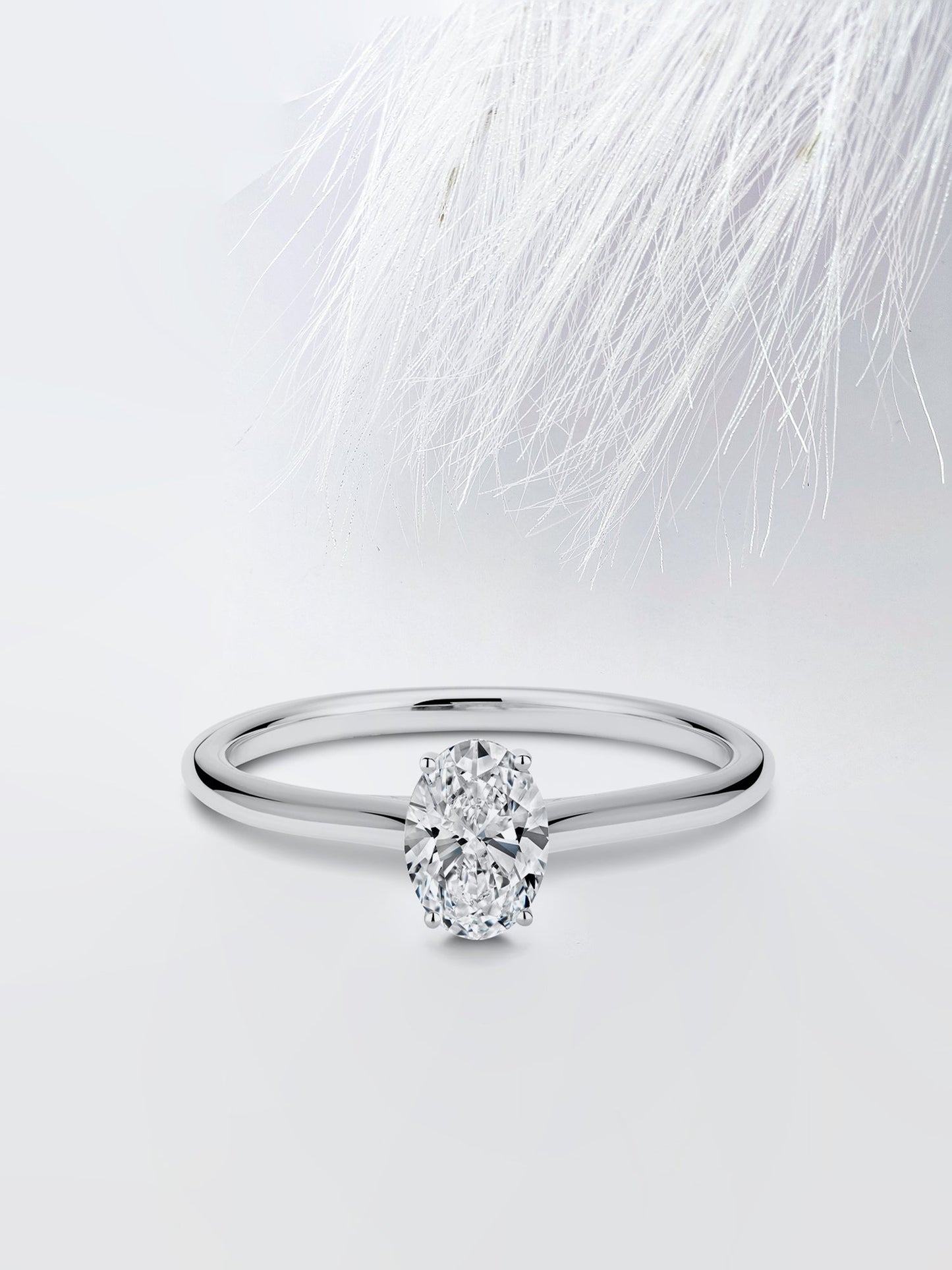 0.75CT Oval Cut Solitaire Moissanite Diamond Engagement Ring in White Gold