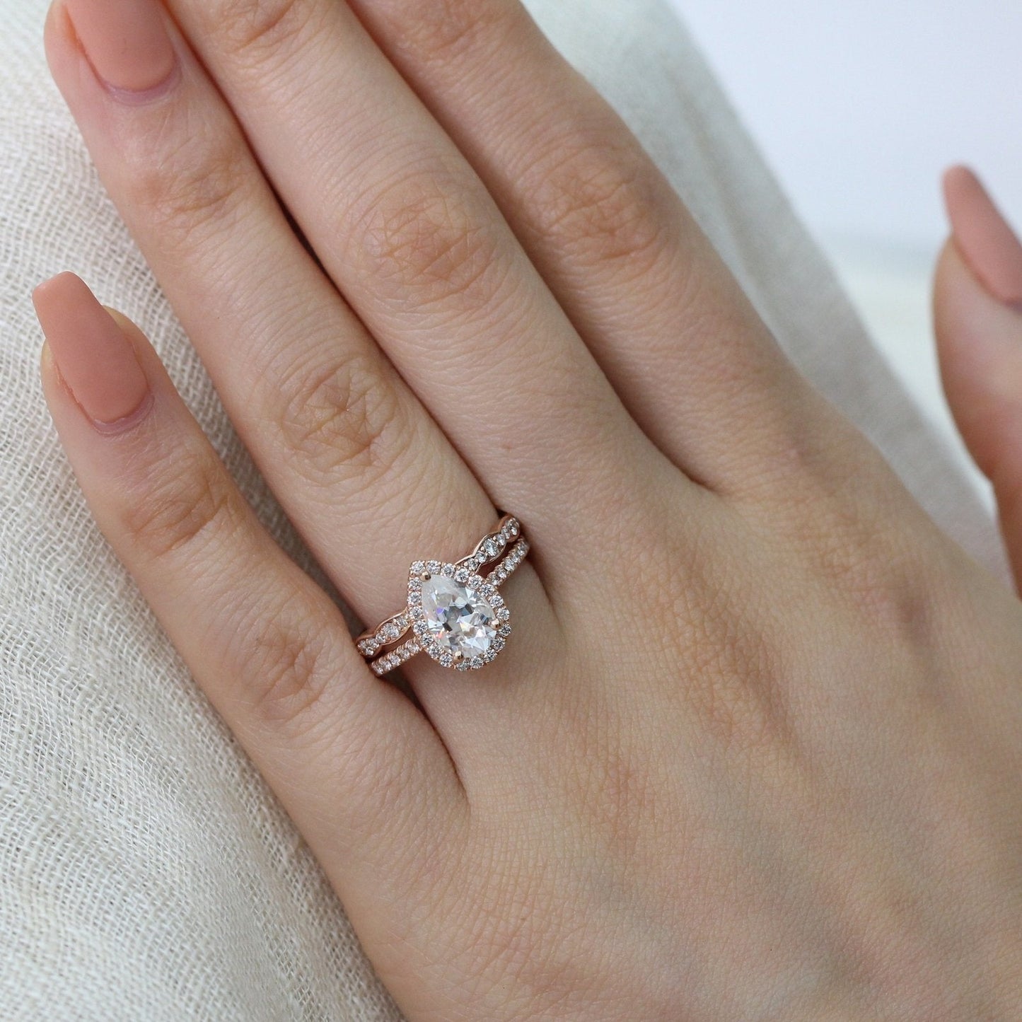 Pear Cut Moissanite Ring With Diamond Band