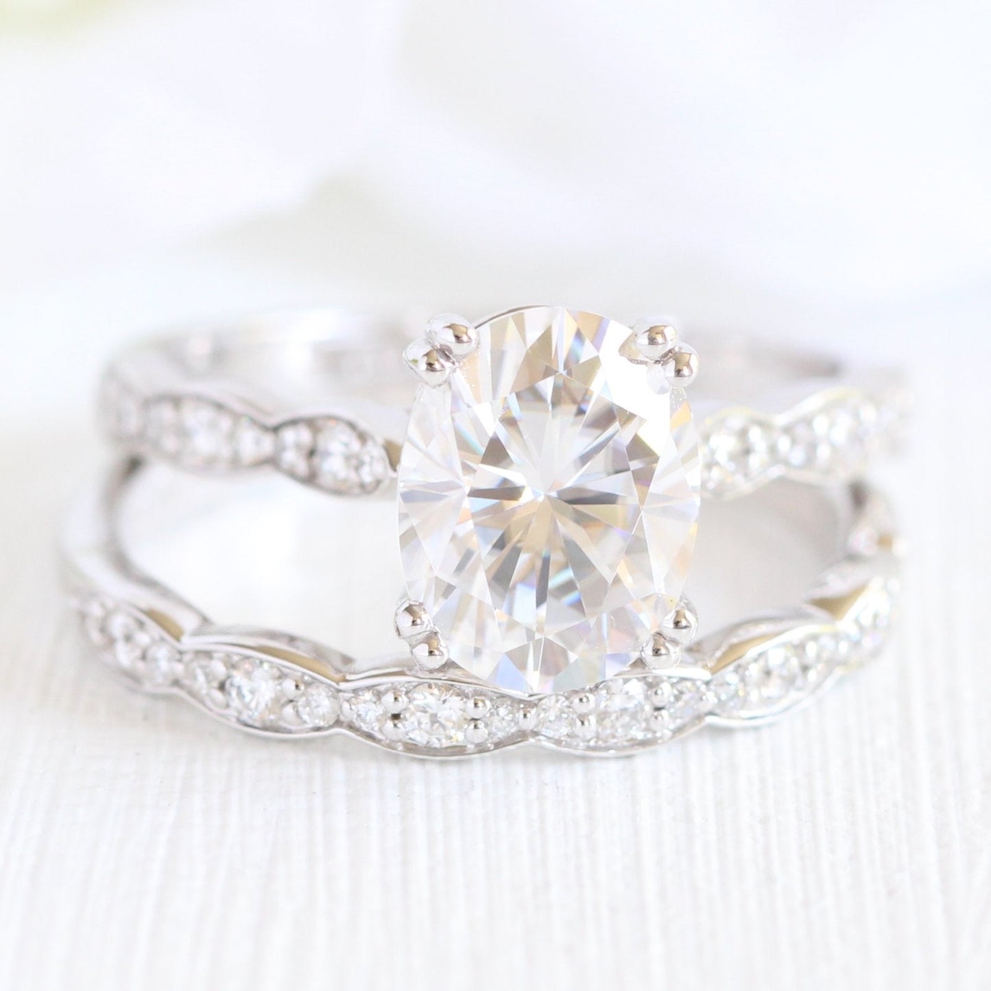 2.0ct Oval Moissanite Double Claw Ring with Unique Wedding Band