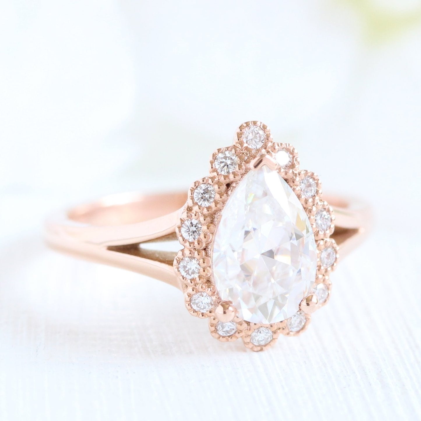 Pear Cut Halo Moissanite Ring With Crown Diamond Band