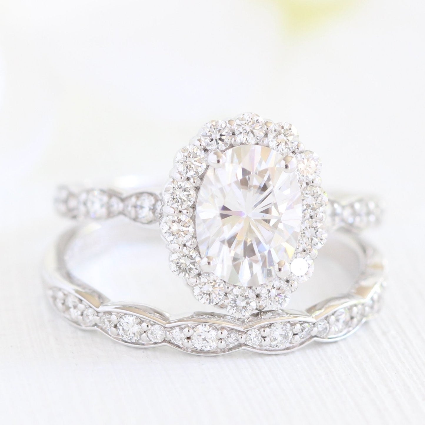 1.50ct Oval Cut Moissanite Halo Engagement Ring with Matching Wedding Band