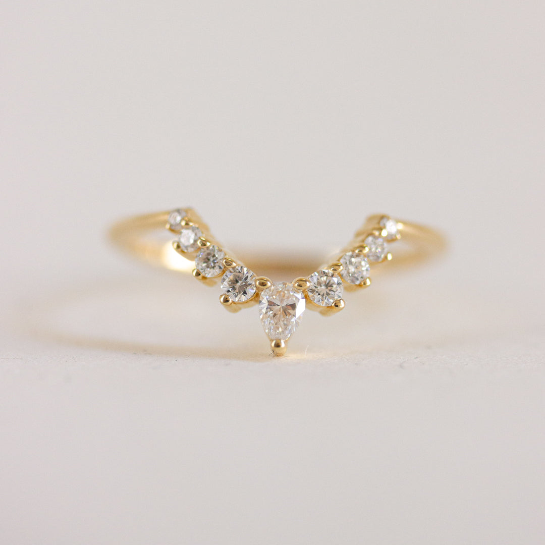 0.22 TCW Pear & Round Moissanite Curved Wedding Band