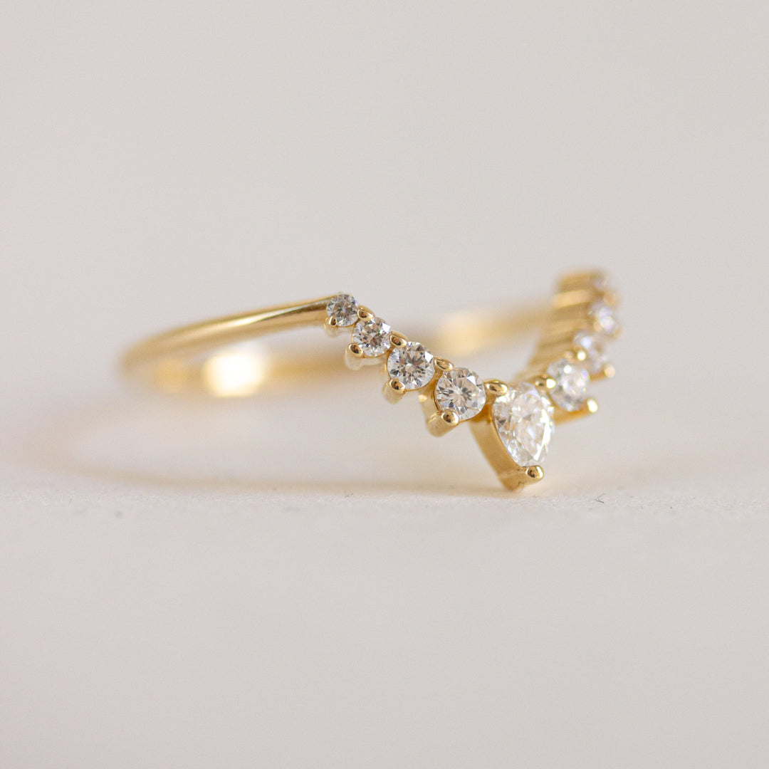 0.22 TCW Pear & Round Moissanite Curved Wedding Band