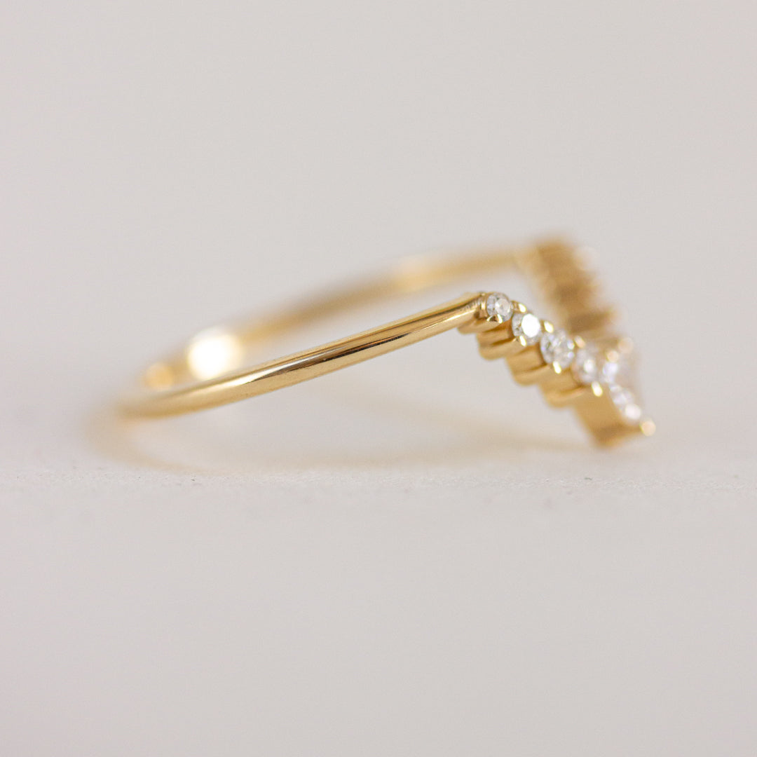 0.22 TCW Pear & Round Moissanite Curved Wedding Band