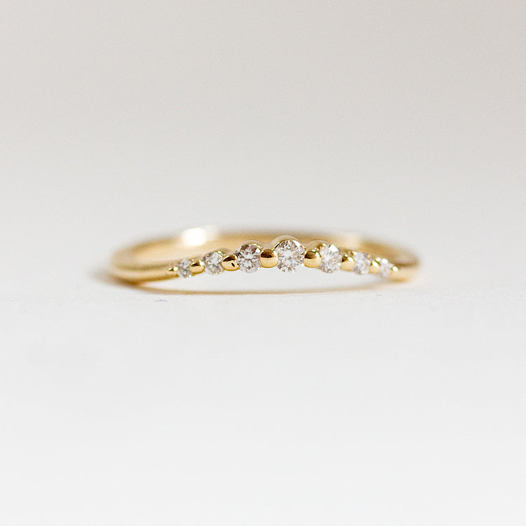 0.12 TCW Round Moissanite Curved Wedding Band