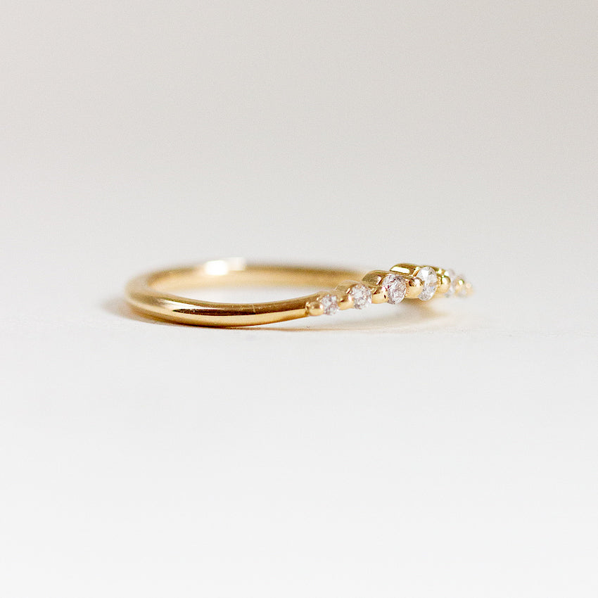 0.12 TCW Round Moissanite Curved Wedding Band