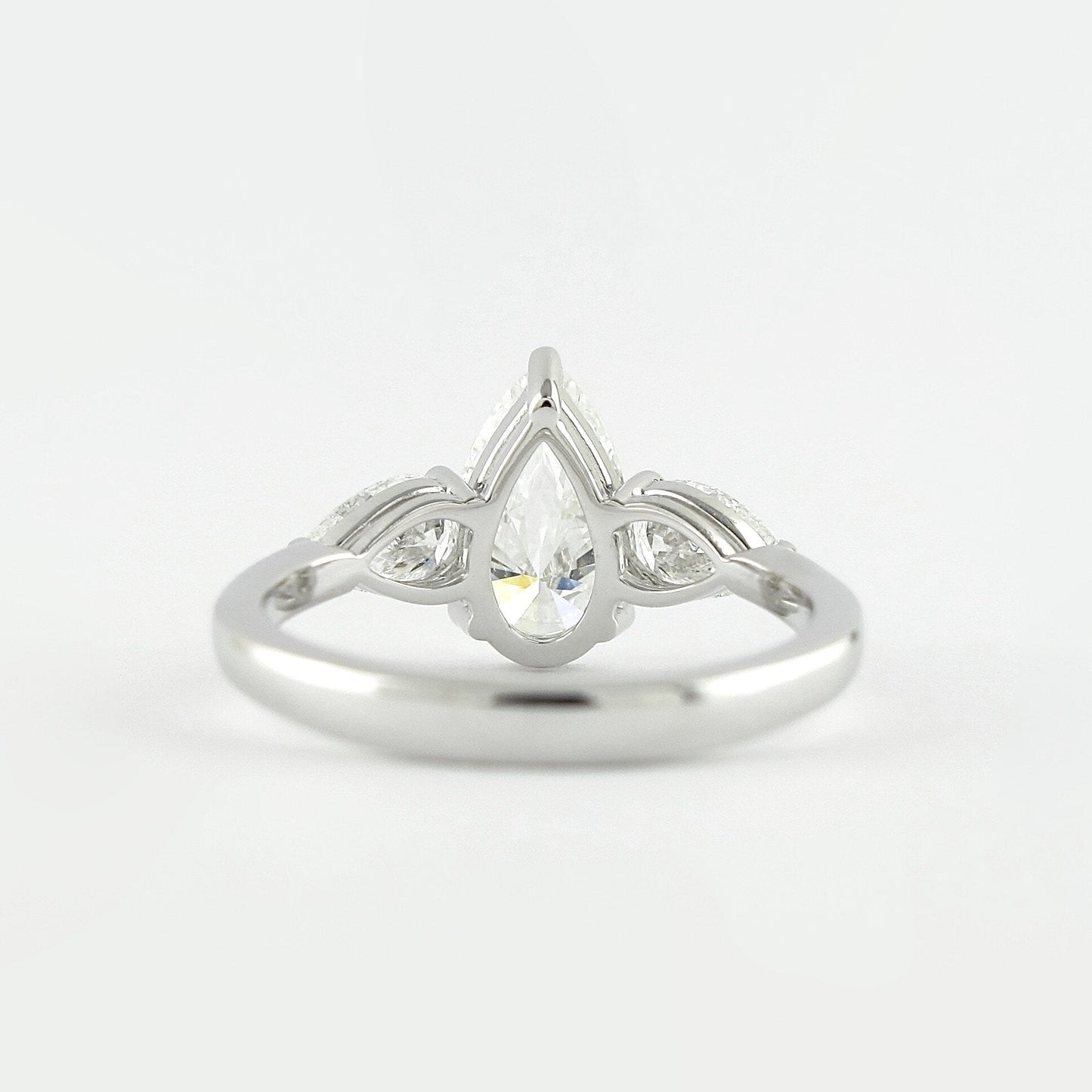 1.50CT Pear Cut Moissanite 3 Stone Engagement Ring in 14K White Gold