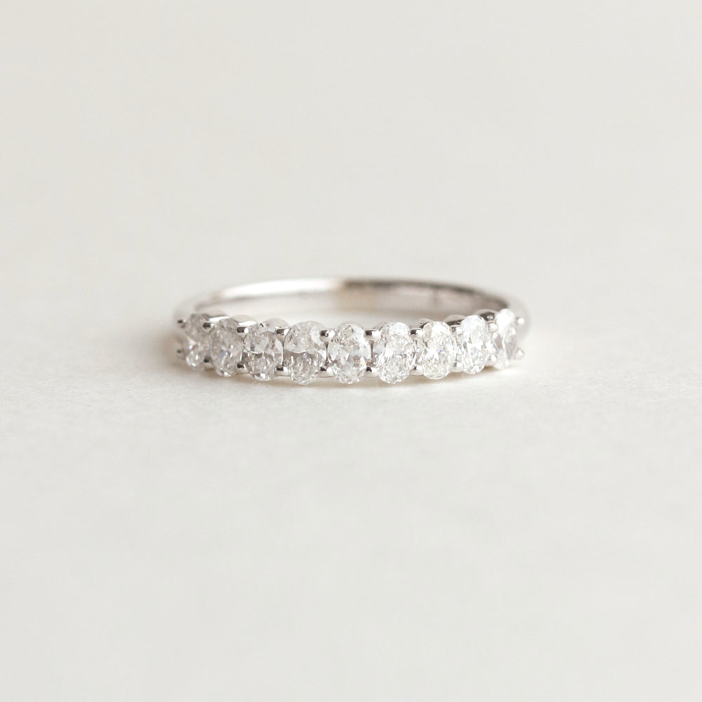 0.54 TCW Oval Moissanite Half Eternity Wedding Band