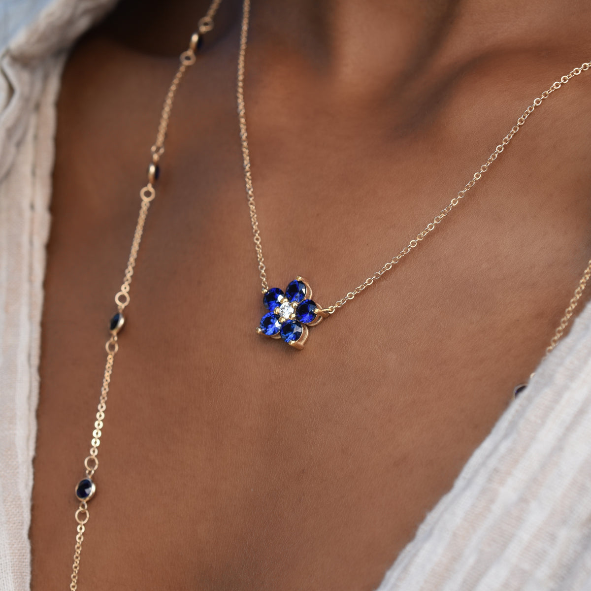 1.45 TCW Round Cut Flower Design Moissanite Necklace-September Birthstone