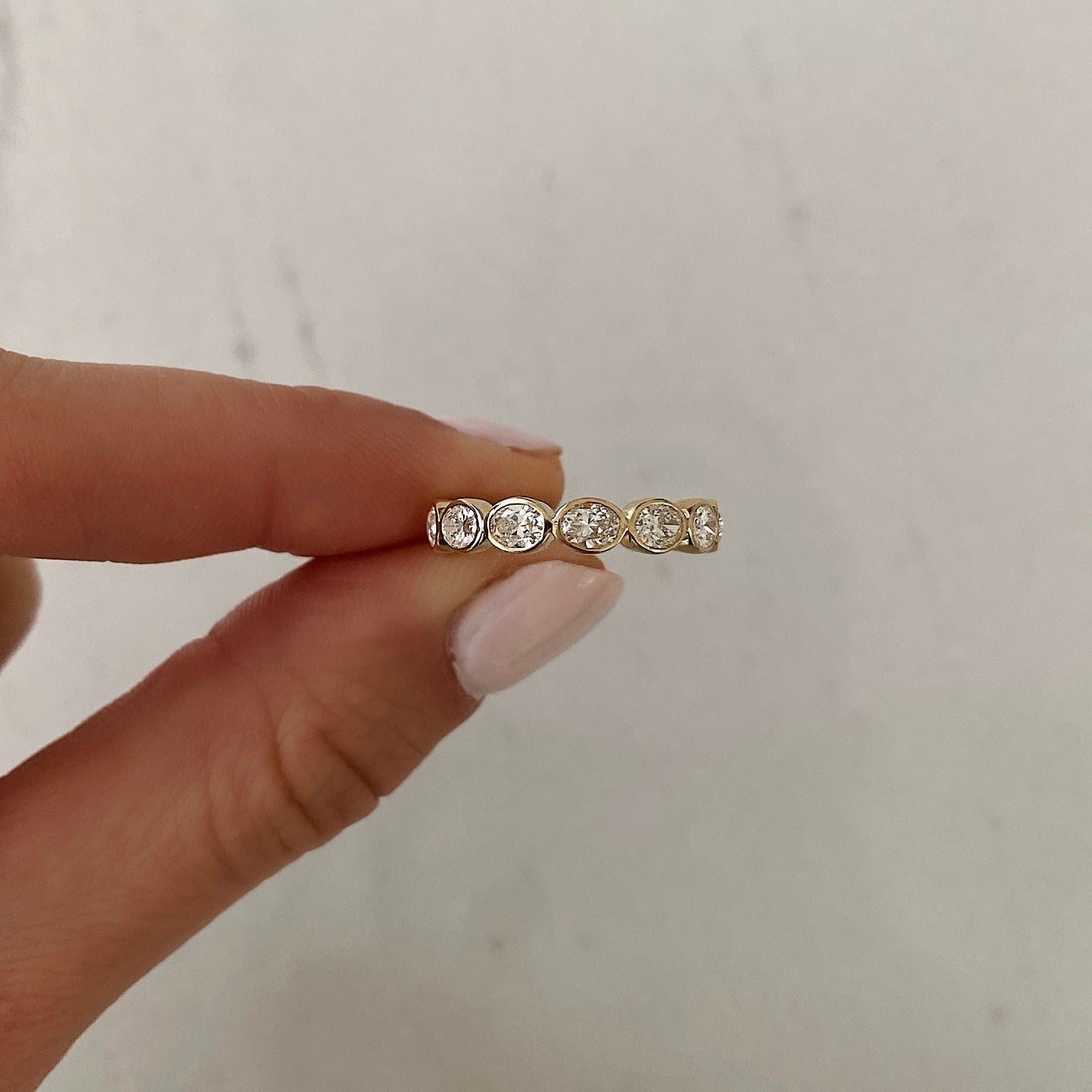 Oval Cut Bezel Diamond Wedding Band For Women