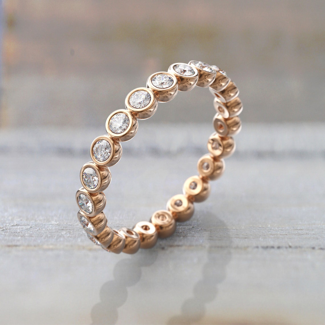 0.77 TCW Round Moissanite Bezel Wedding Band