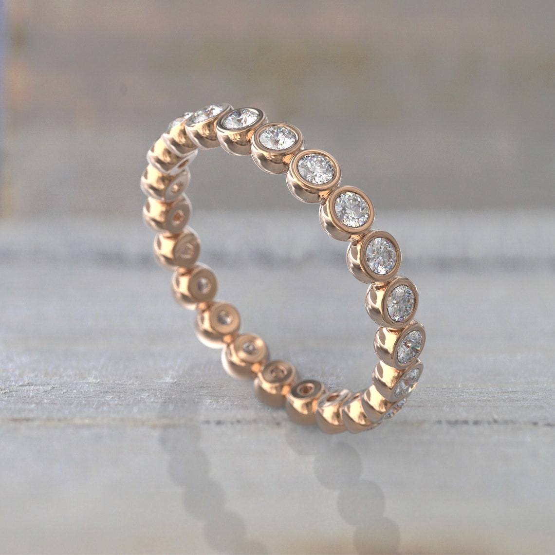 0.77 TCW Round Moissanite Bezel Wedding Band