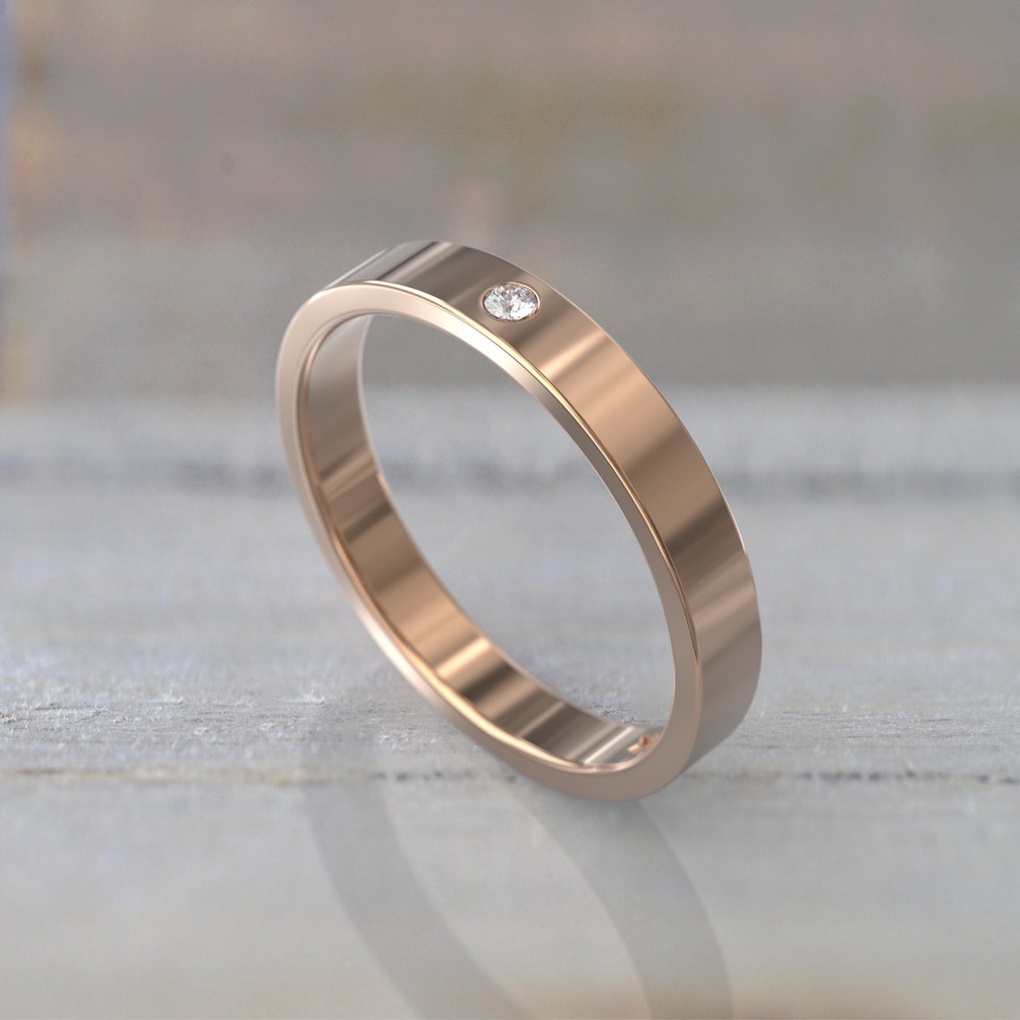 0.02 TCW Round Moissanite Flush Wedding Band