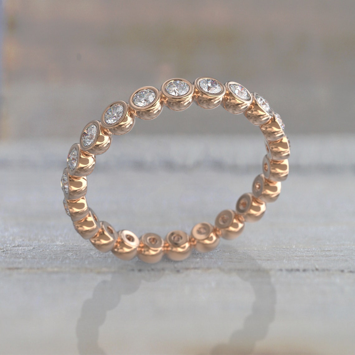 0.77 TCW Round Moissanite Bezel Wedding Band