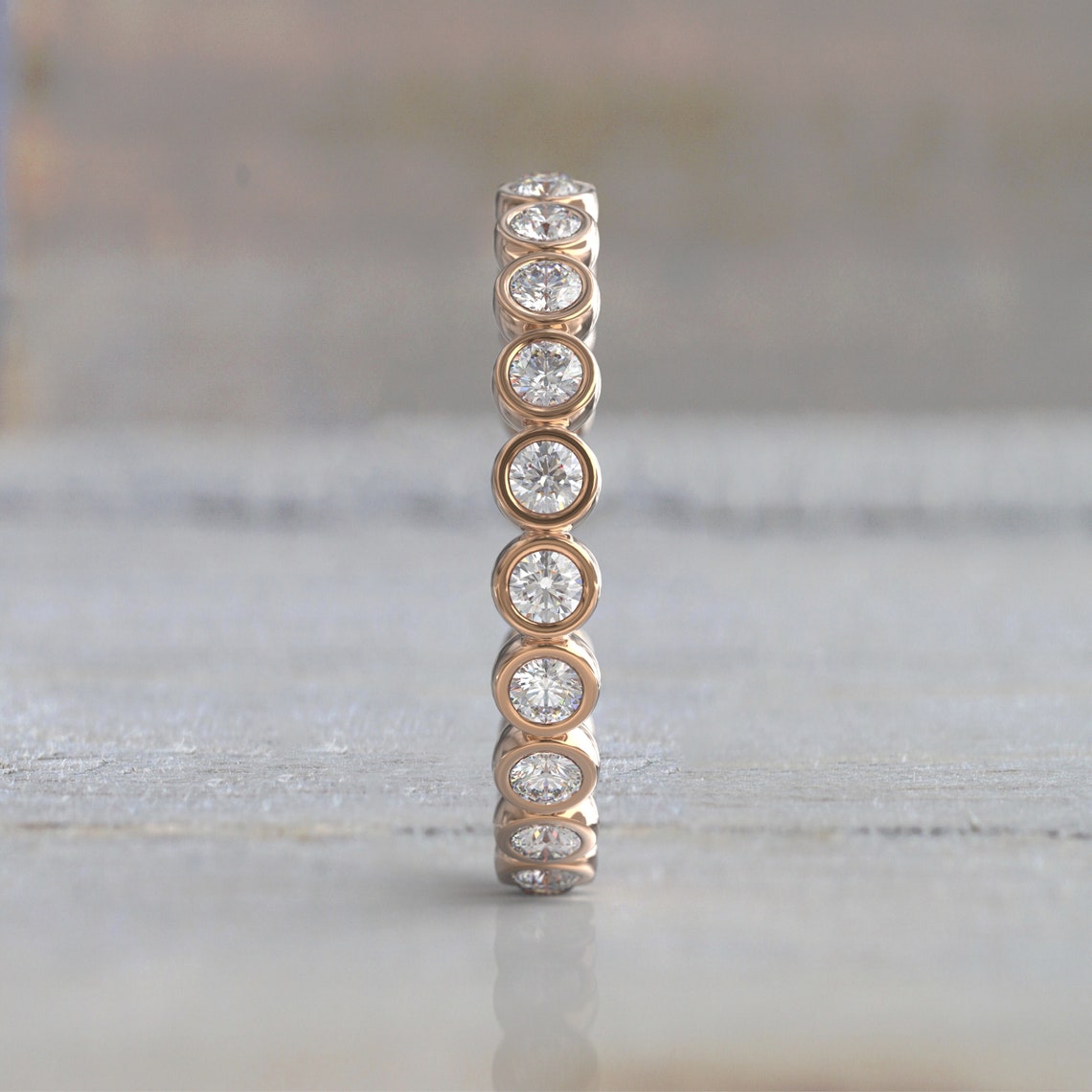 0.77 TCW Round Moissanite Bezel Wedding Band