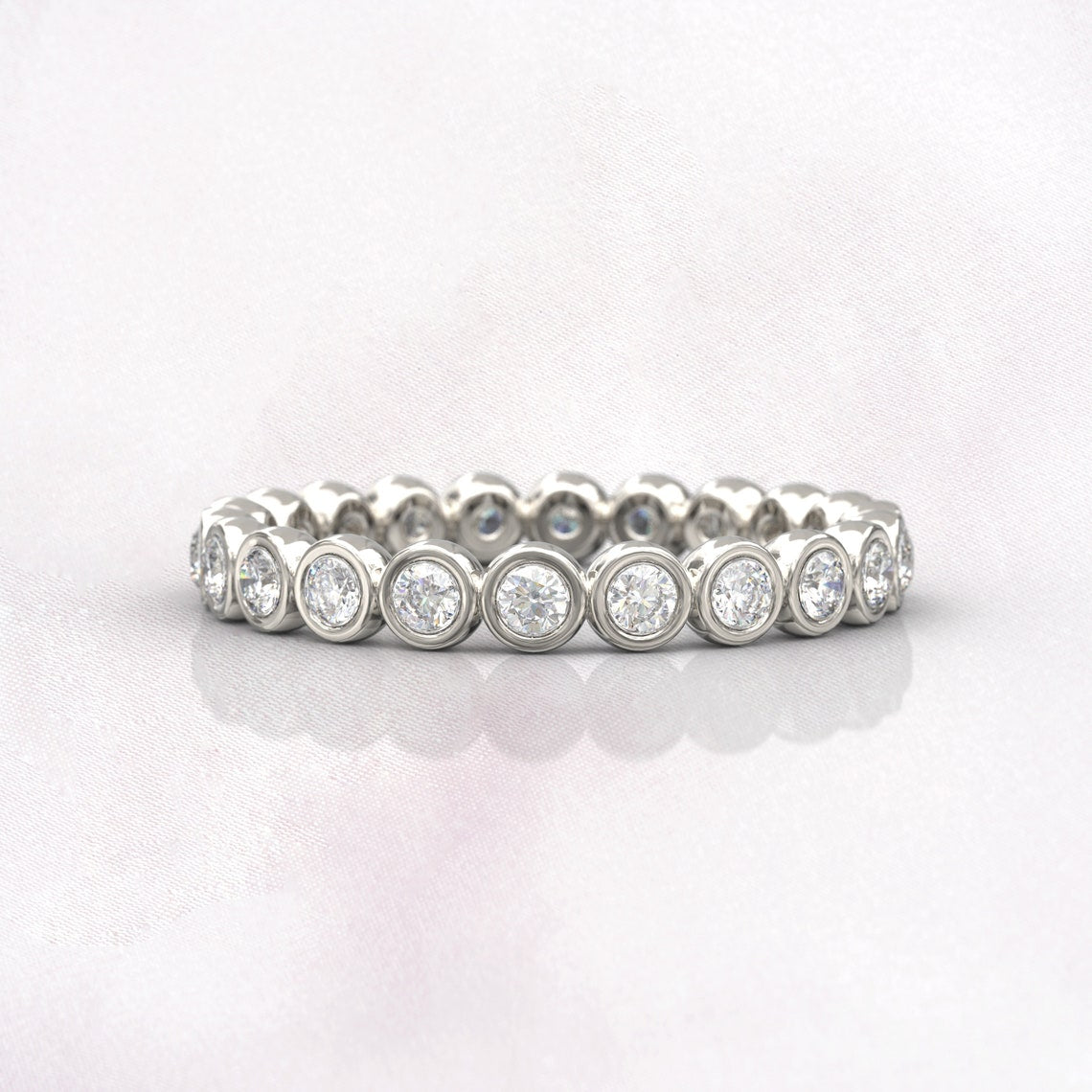 0.77 TCW Round Moissanite Bezel Wedding Band