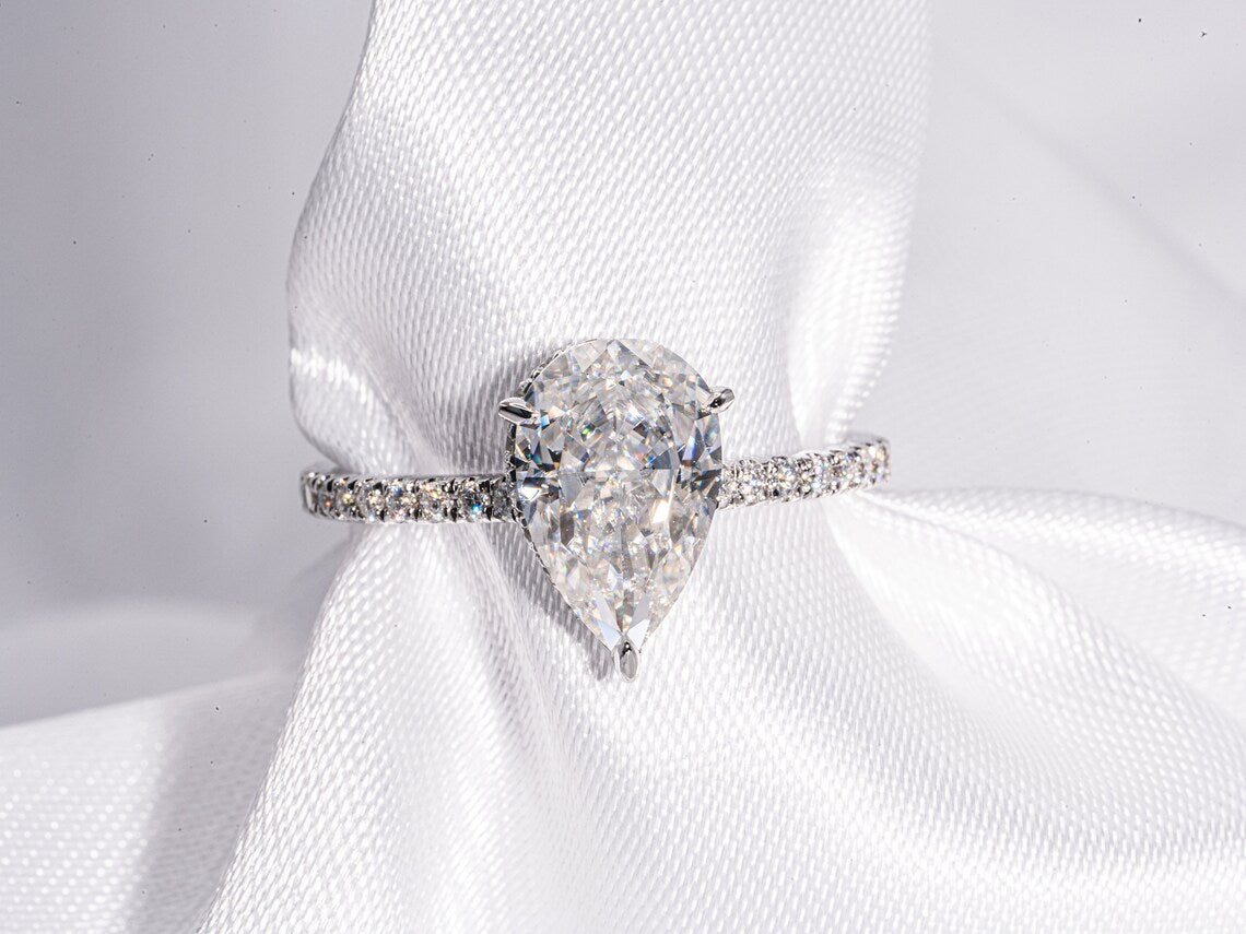 3.0 CT Pear Moissanite Hidden Halo Engagement Ring With Pave Setting