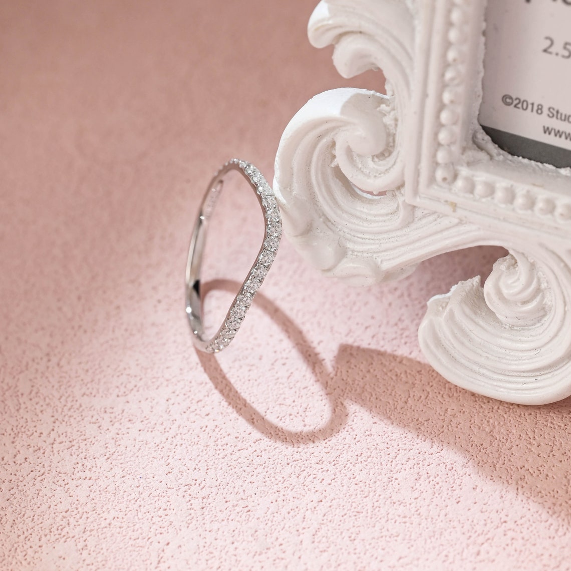 0.70 TCW Round Moissanite Curved Wedding Band