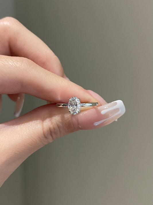 1.0ct Oval Cut Solitaire Moissanite Diamond Four Prong Engagement Ring
