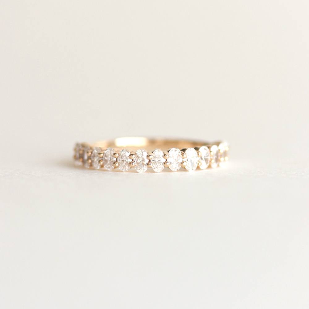 0.54 TCW Oval Moissanite Half Eternity Wedding Band
