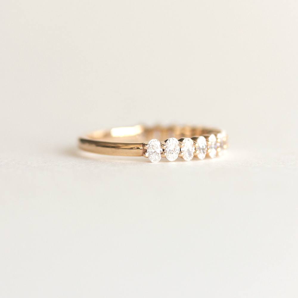 0.54 TCW Oval Moissanite Half Eternity Wedding Band