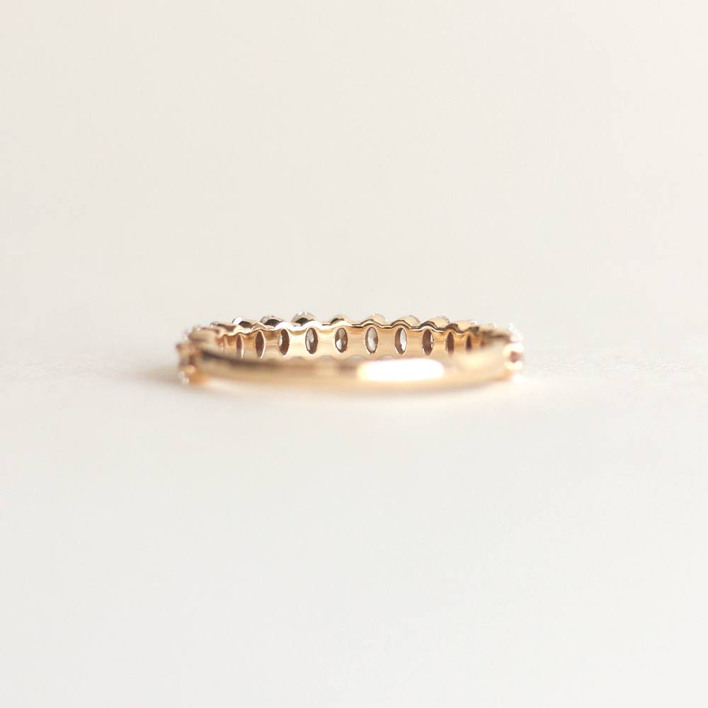 0.54 TCW Oval Moissanite Half Eternity Wedding Band
