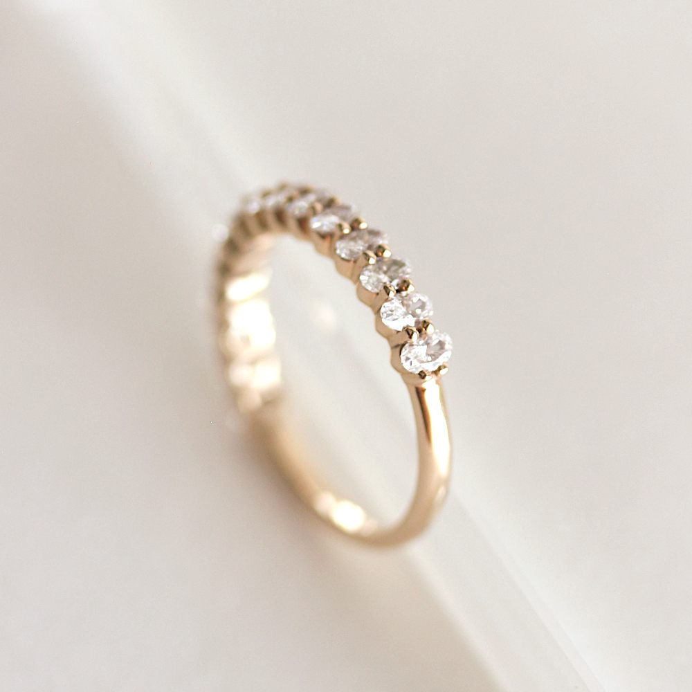 0.54 TCW Oval Moissanite Half Eternity Wedding Band