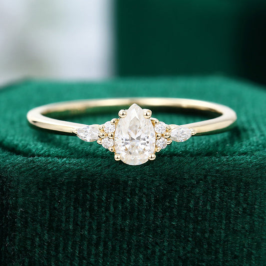 0.69 CT Pear Shaped Moissanite Cluster Engagement Ring