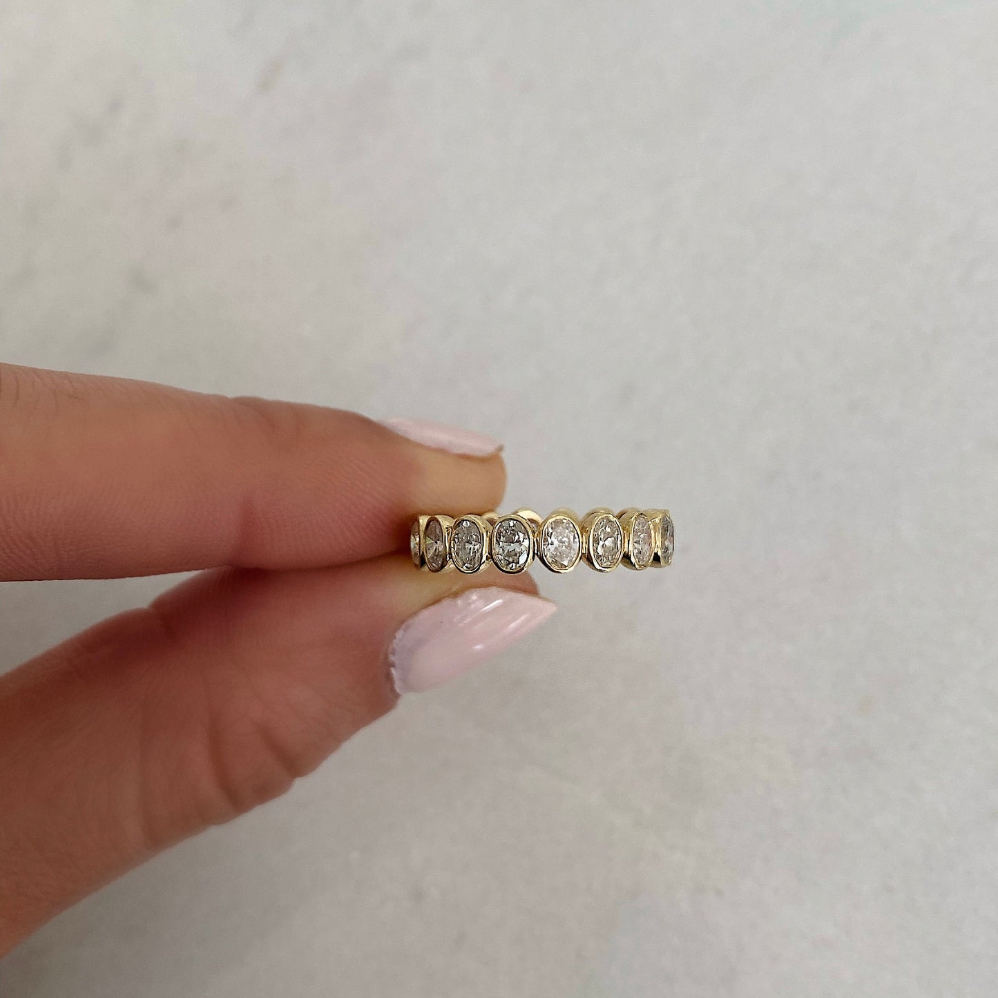 Oval Cut Bezel Diamond Wedding Band For Women