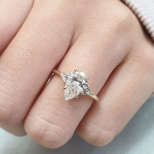Pear Cut Cluster Moissanite Diamond Engagement Ring in 14K Yellow Gold